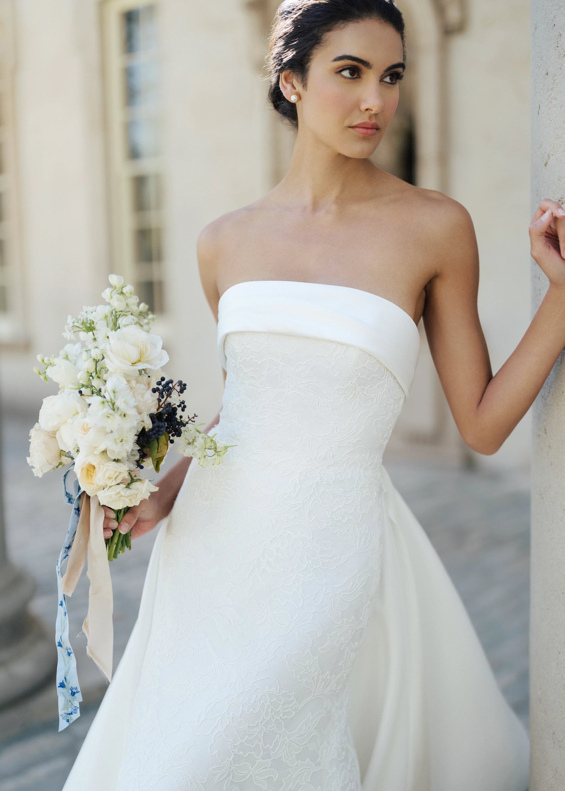 The Rhodes Train by Anne Barge is a box pleated detachable train of Kalika in Silk White.