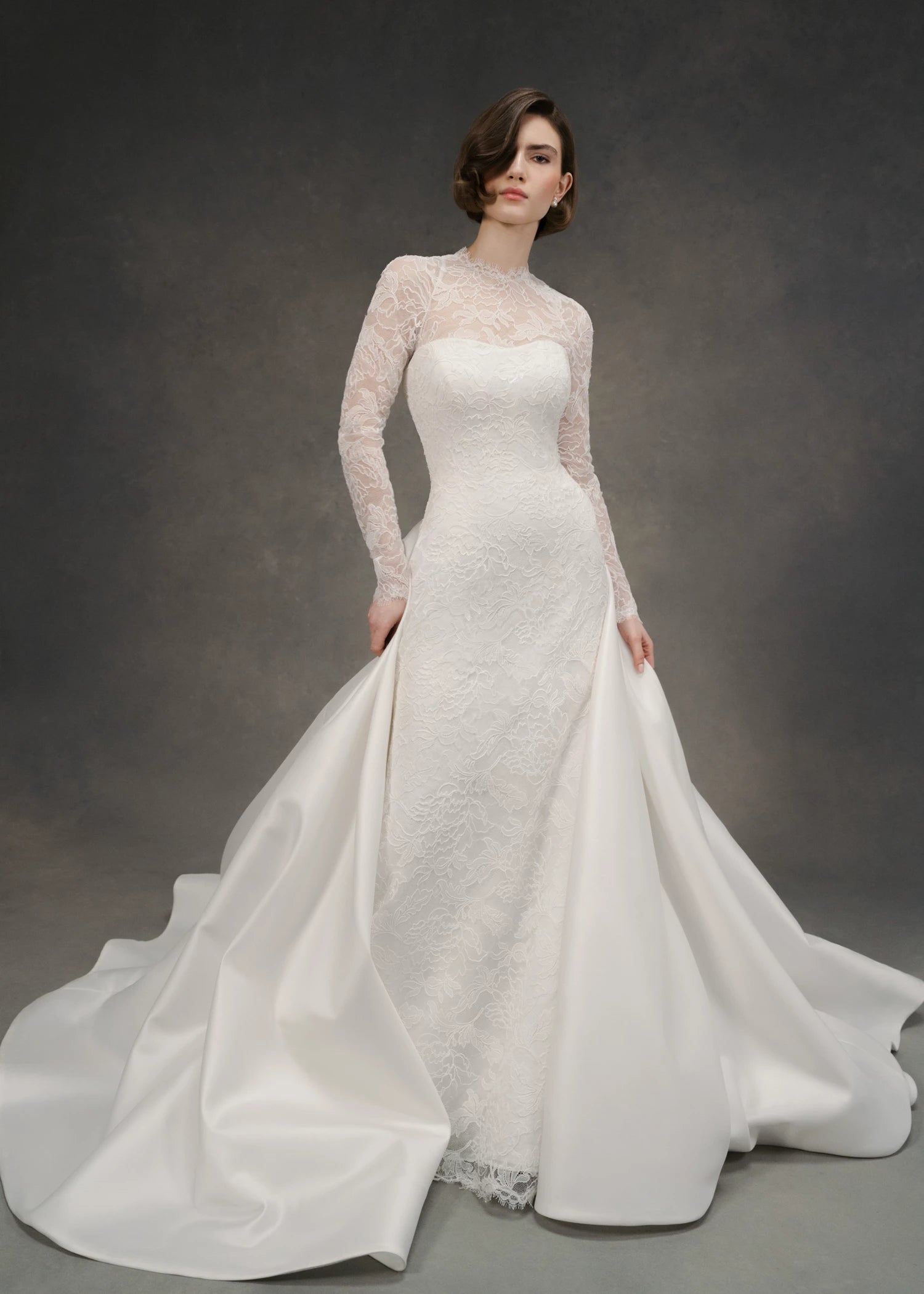 The Rhodes Topper by Anne Barge is a long sleeve jewel neck top of Corded Lace in Silk White.