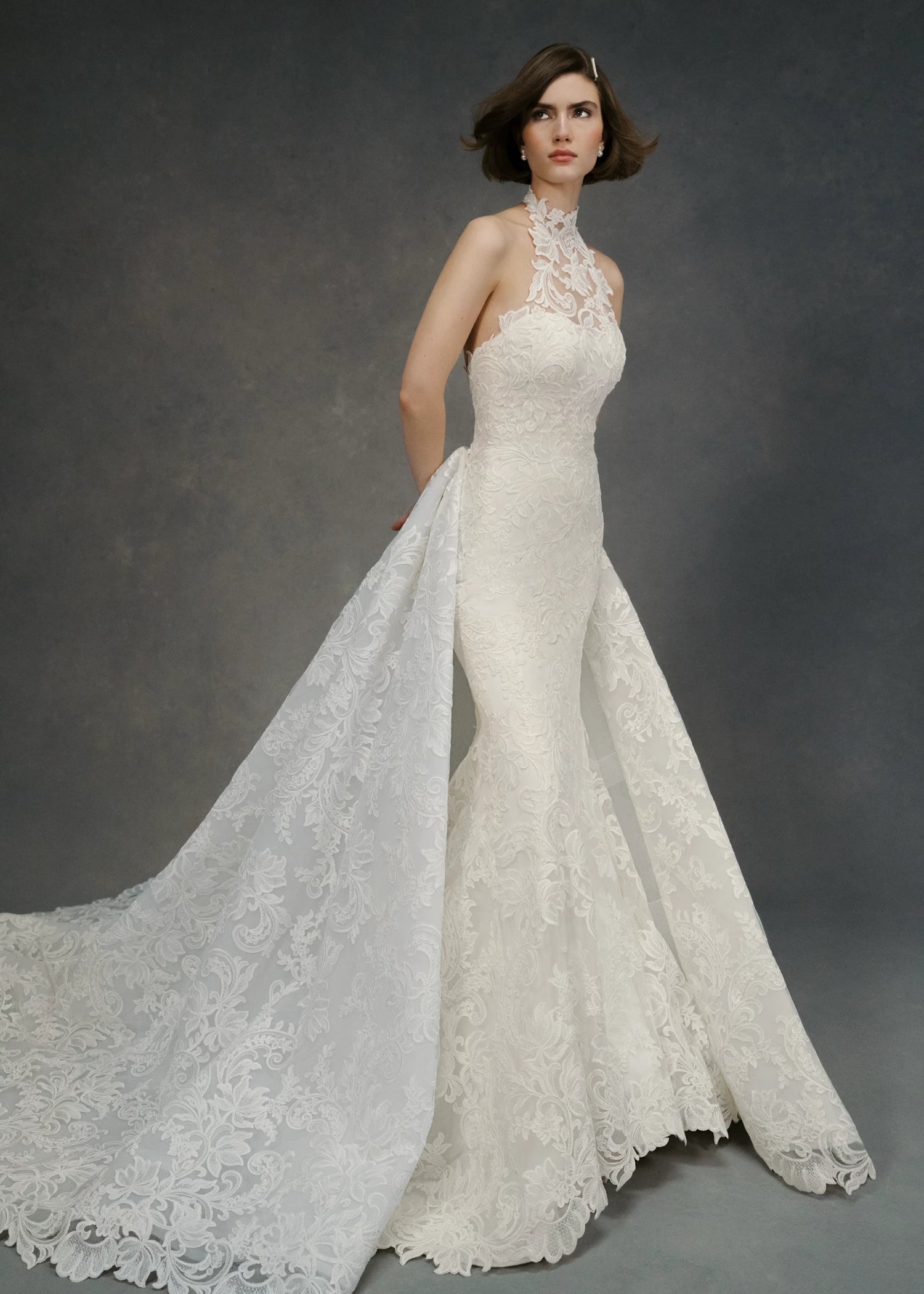 The Selena Train by Anne Barge is a pleated dramatic detachable train of swirling Vine and Leaf Embroidered Lace in Pearl.