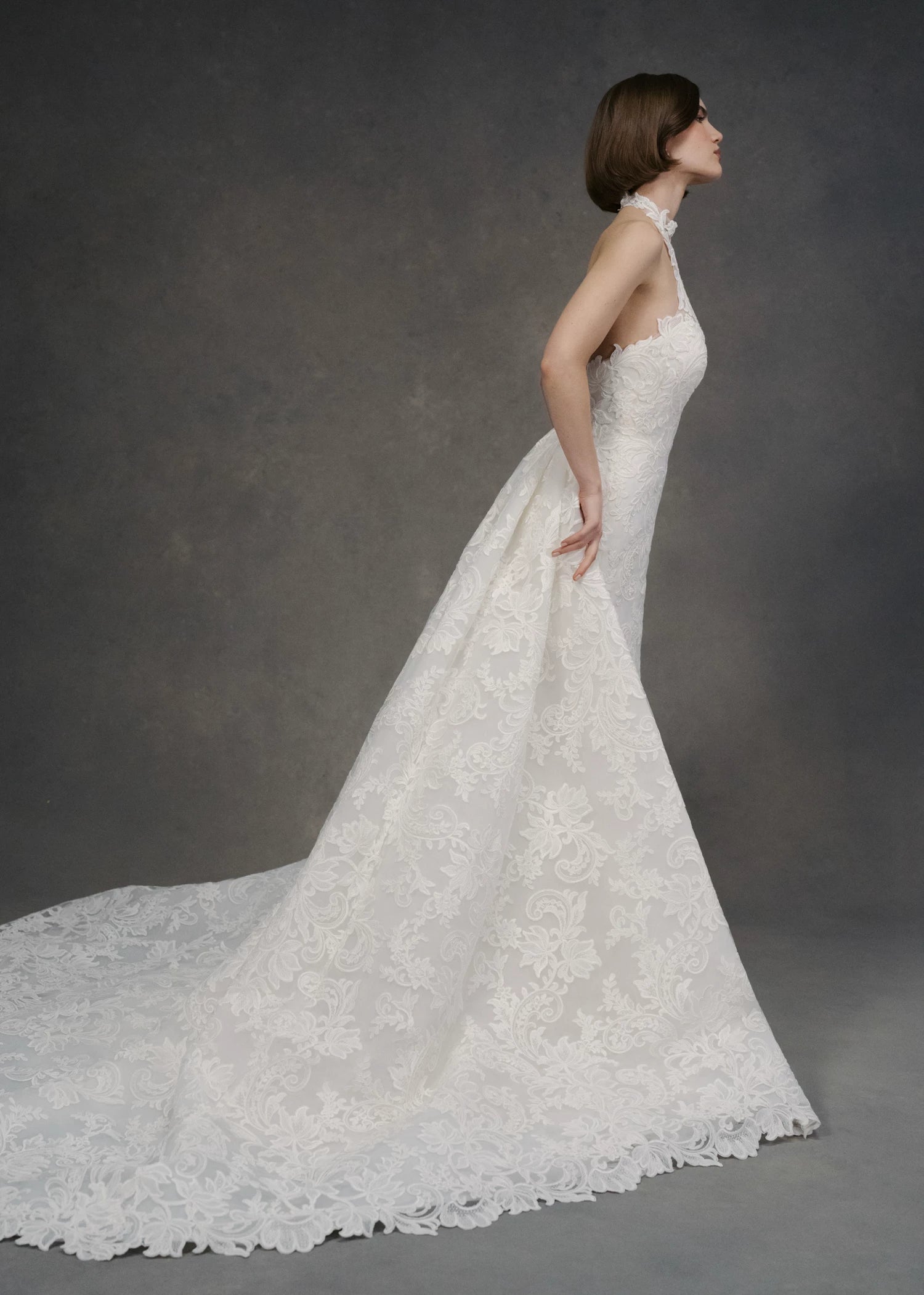 The Selena Train by Anne Barge is a pleated dramatic detachable train of swirling Vine and Leaf Embroidered Lace in Pearl.