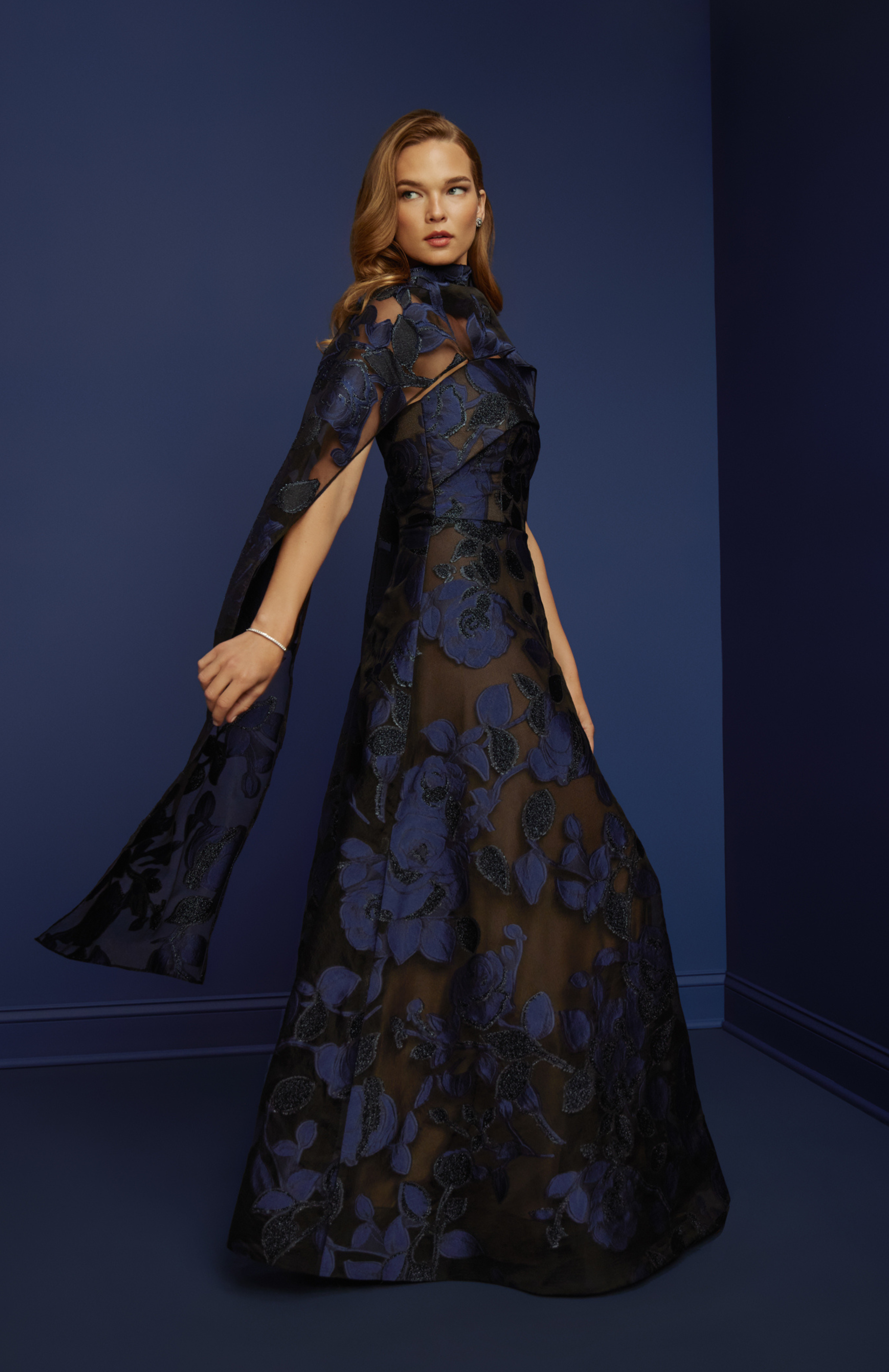 The Splendor Stole from Black Label by Anne Barge is a rectangular stole of Metallic Jacquard Floral Organza in Navy/Black.