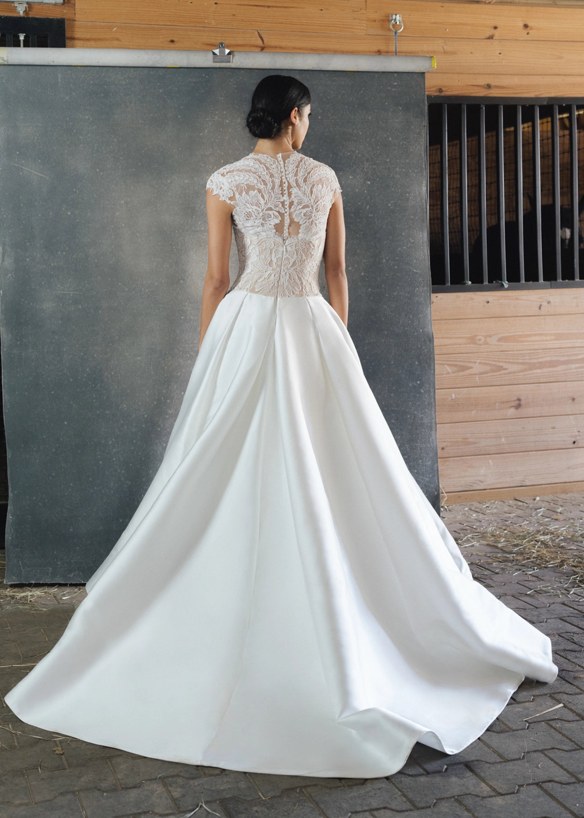 The Wessex Topper by Anne Barge in an illusion tulle cap sleeve topper with Alencon lace appliques in Silk White.