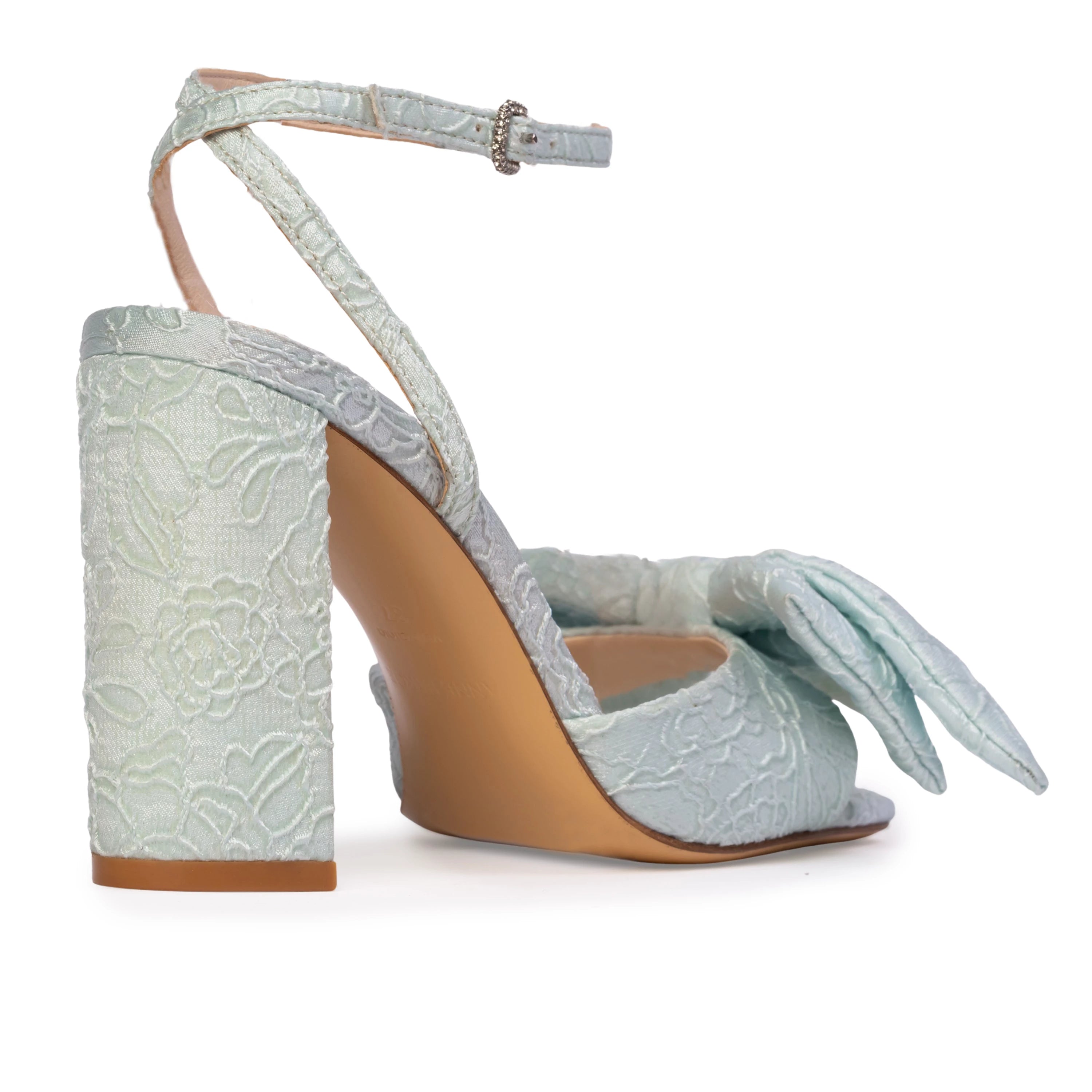crystal-embellished square buckle and a softly draped bow detail across the upper. Crafted from luxurious satin jacquard.