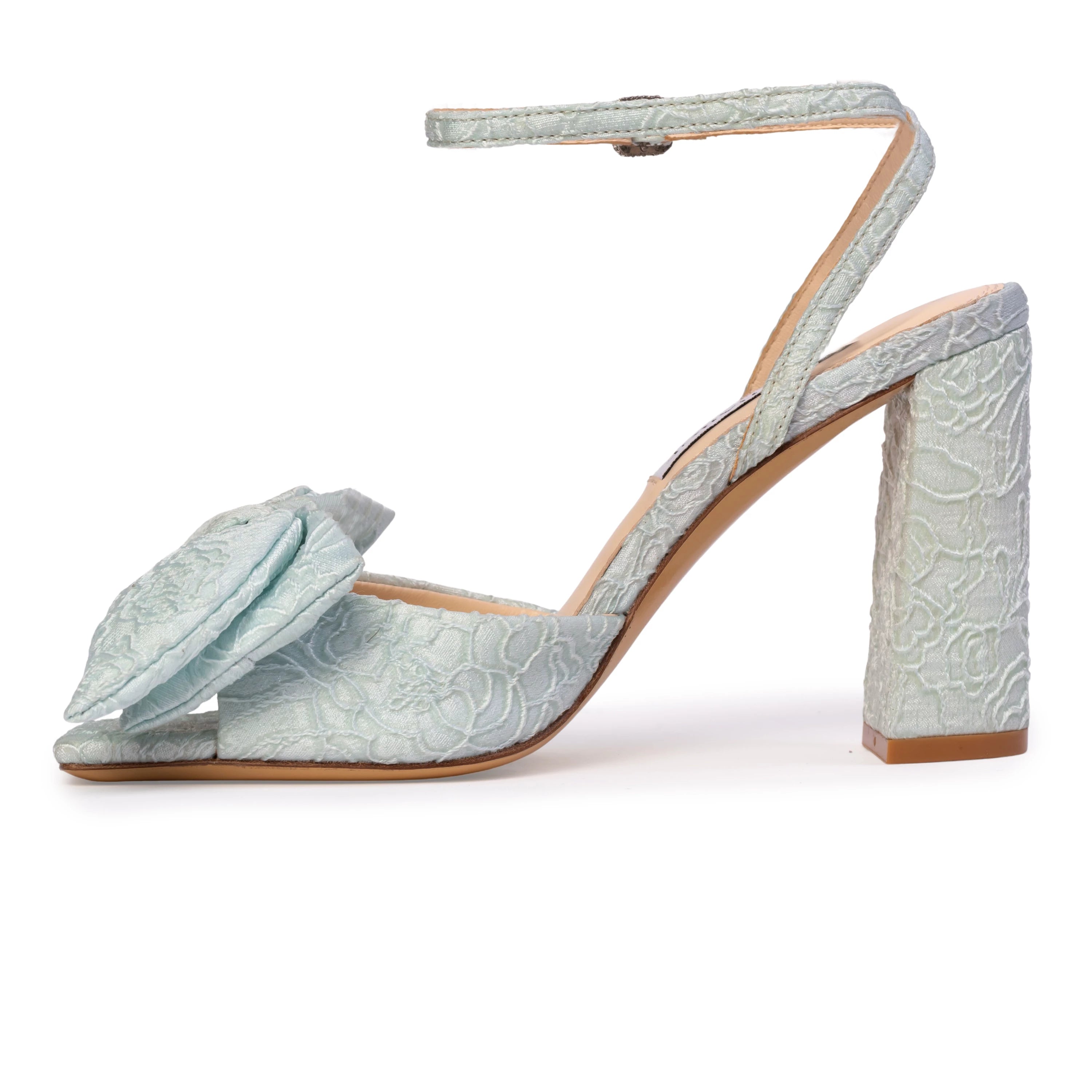 crystal-embellished square buckle and a softly draped bow detail across the upper. Crafted from luxurious satin jacquard.