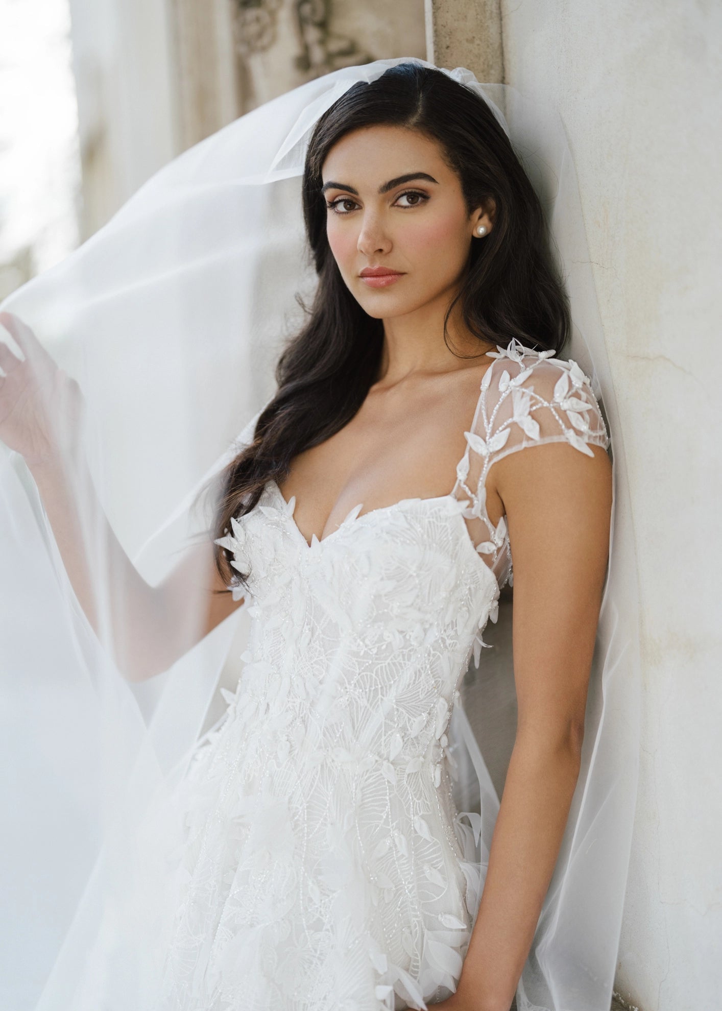 The Woodruff Shawl by Anne Barge is a keyhole style shawl of Illusion tulle with 3D Feathery Petal Embroidery.