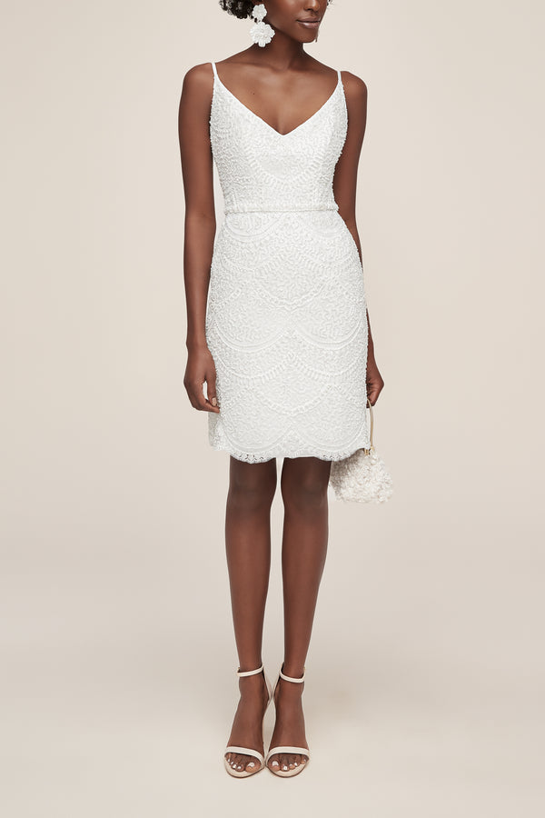 Beaded white dress for wedding celebration